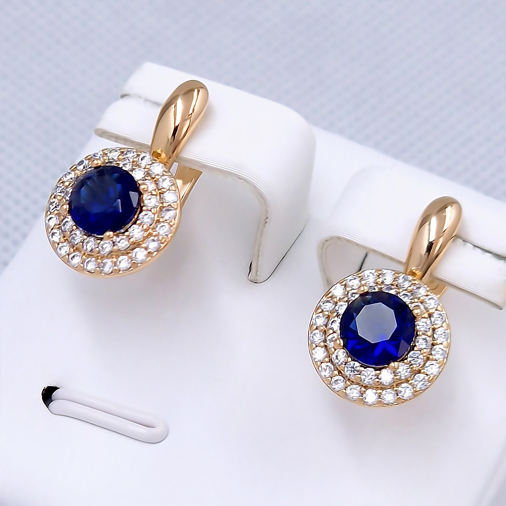 Сережки ХР. Позолота 18К. Камені: білий та синій циркон. Довжина: 19 мм. Ширина: 11 мм