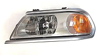 Фара передняя Mitsubishi Pajero Sport i 00-08 передн. лев. (мех/эл) (без ламп) (H4/W21W/W5W) (с габаритом