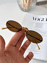 Сонцезахисні жіночі окуляри овальні вузькі коричневі