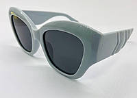 Солнцезащитные женские очки в пластиковой массивной оправе с поляризованными линзами голубой нюд