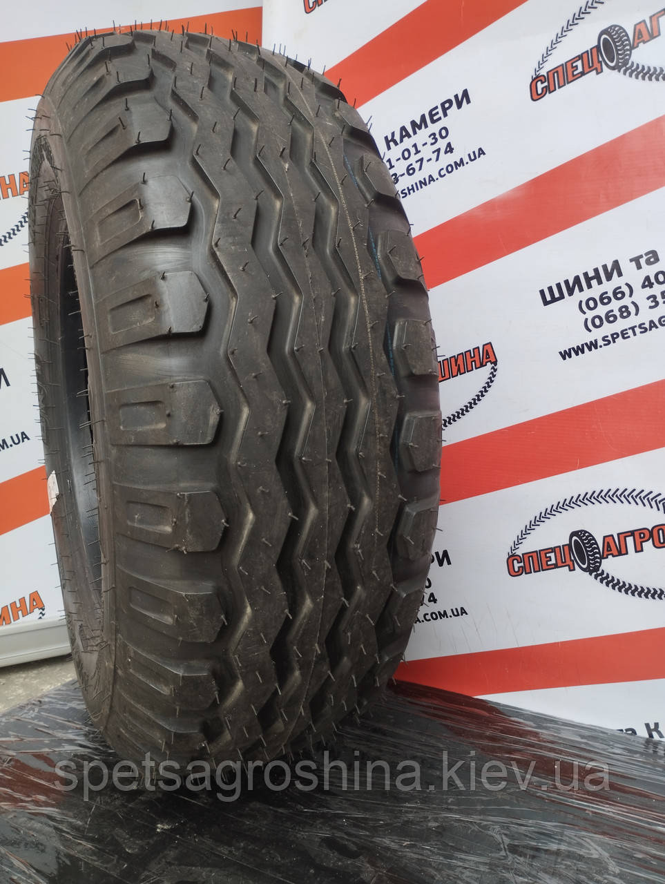 Шина 10.0/75-15.3 18PR BKT AW-909 TL