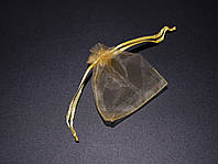 Мешочек для упаковки ювелирных украшений и небольших сувениров из органзы. Цвет золотистый. 7х9см