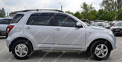 Вітровики вікон Дайхатсу Теріос 2 (дефлектри бічних вікон Daihatsu Terios 2)