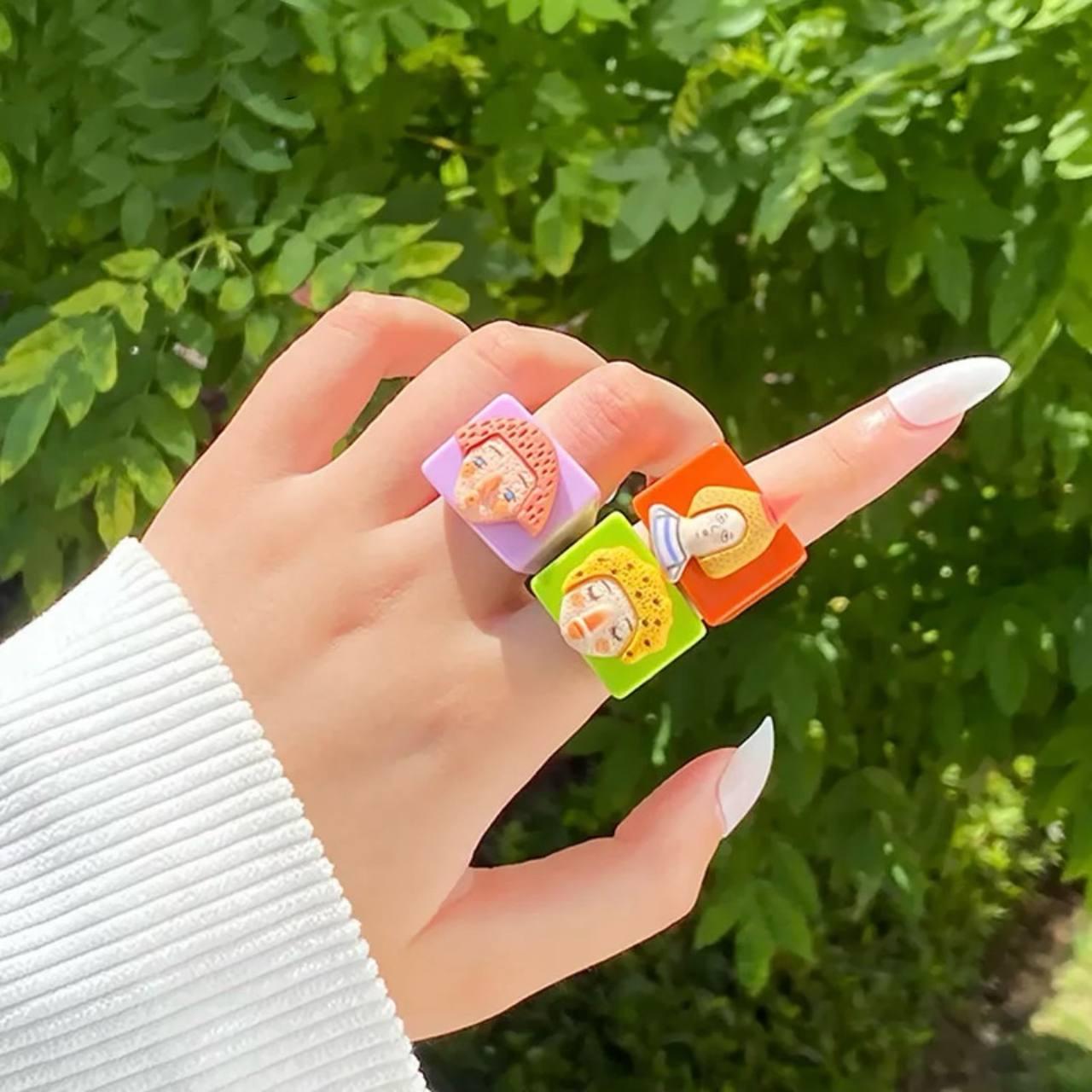 Кумедні кільця з чоловічками: знайди свій портрет, фото 1