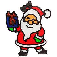 Силіконова наклейка на скло "Санта Клаус тримає подарунок" 13-63-02, 20 х 15 см un