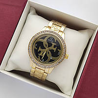 Жіночий наручний годинник Guess (Гес) золотистий з чорним, камінчики навколо циферблату - код 2370b