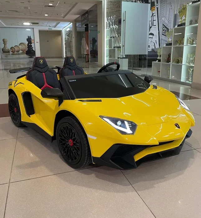 Дитячий двомісний електромобіль Lamborghini Aventador SVJ 24V (жовтий колір), фото 1