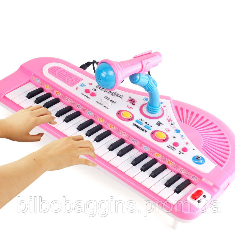 Дитячий синтезатор із мікрофоном. Електросинтезатор для дітей Розвиваюча іграшка синтезатор 37 клавіш