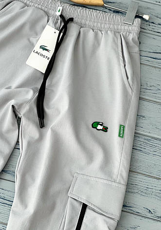Чоловічі джогери Lacoste штани карго з бічними кишенями сірі, фото 1