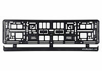 Рамка під номерний знак авто VOREL : чорна, 529 х 132 х 11 мм (пластикова) [50] Chinazes Это Просто