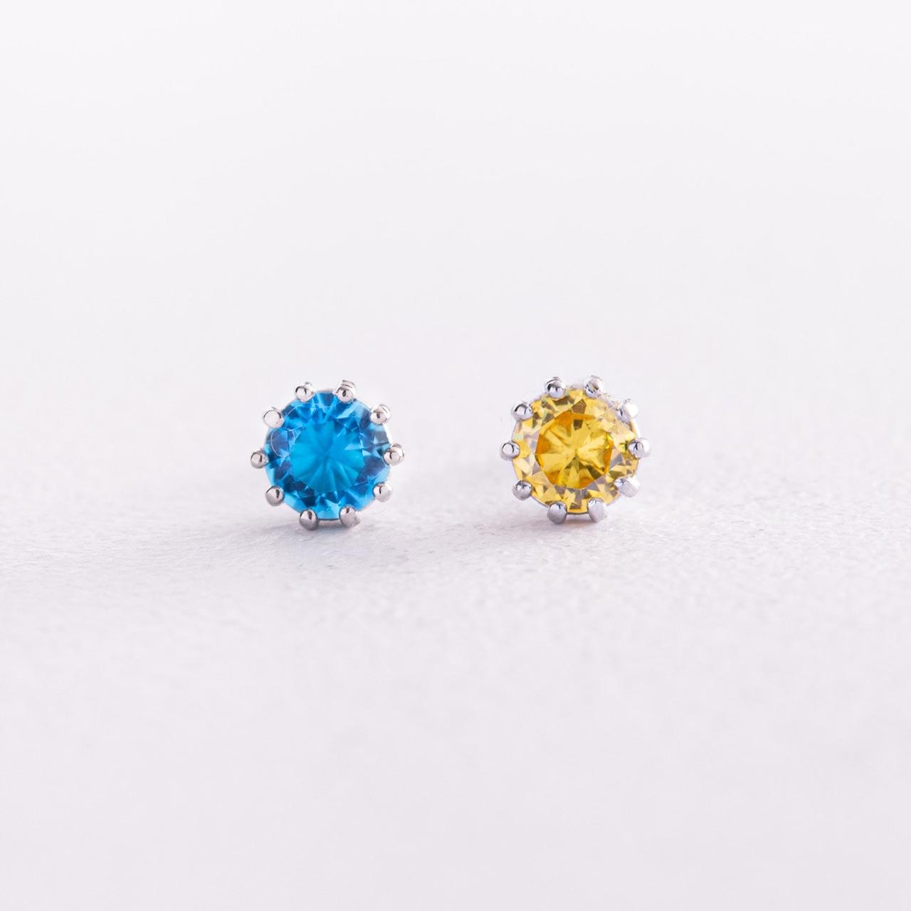 Срібні сережки — пусети (блакитні та жовті 
камни) 308 INTERSHOP