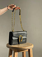 Женская сумка на толстой золотой цепочке с подковой рептилия крокодил питон змея черная