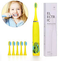 Зубная электрическая щетка детская желтая на батарейке с насадками 6шт с умным таймером. zap - 1419