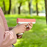 Водяний пістолет електричний на акумуляторі Water Gun Glock з 2 обоймами для води, рожевий, фото 4