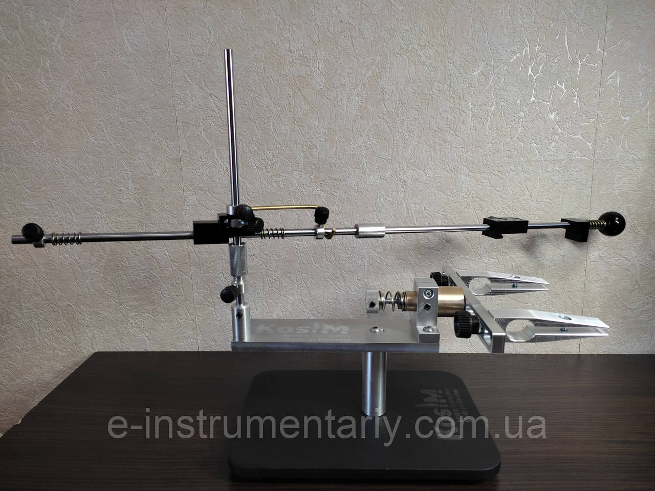 Пристрій для заточування ножів з подіумом