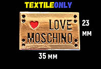Пришивная металлическая эмблема I love Moschino 23х35 мм
