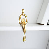 СТАТУЕТКА ЛЮДИНА З КНИГОЮ