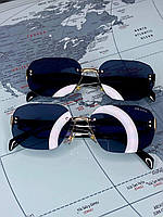 Очки Prada солнцезащитные женские черные с золотом безободковые Прада прямоугольные