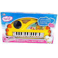 Игрушечное пианино 9012 со световыми и звуковыми эффектами 34 см желтый