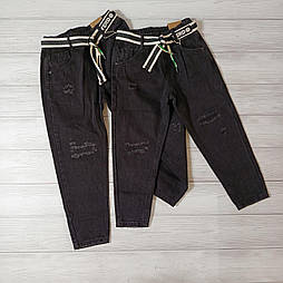 Чорні рвані джинси джогери на хлопчика з поясом на гумці та підвужені донизу в розмірі 176