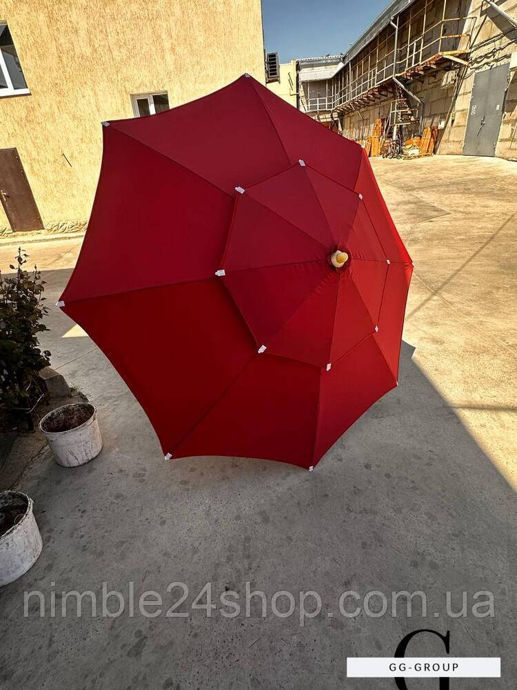 Торгова парасолька-антивітер Monsen 2.5 м – надійний захист та комфорт на відкритих майданчиках бордо.