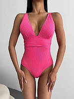 Гарний жіночий рожевий суцільний купальник з глибоким декольте, Стильний однотонний купальник пландж S