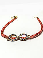 ЧЕРВОНА НИТКА – АМУЛЕТ ЗАХИСТУ ТА ПОЗИТИВНОЇ ЕНЕРГІЇ. З підвіскою нескінченність у зотому кольорі