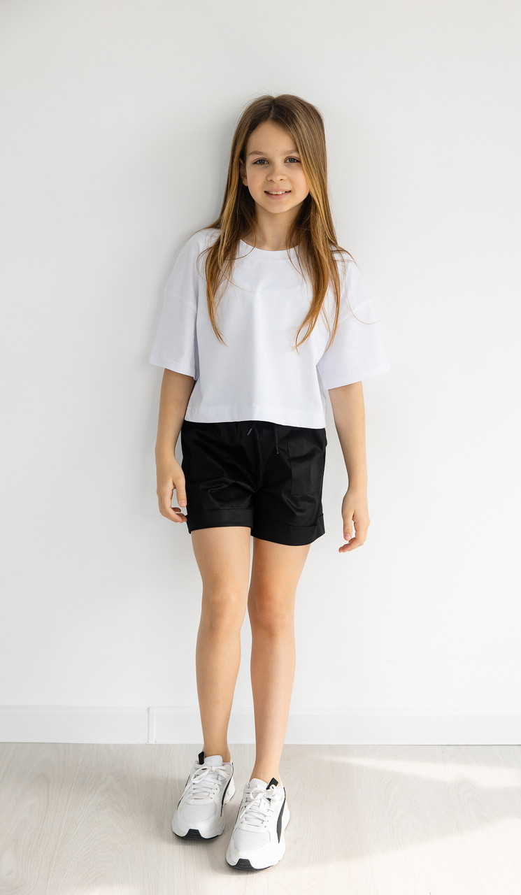 Шорти карго для дівчинки з накладними кишенями (134-158см) | Котон чорного кольору