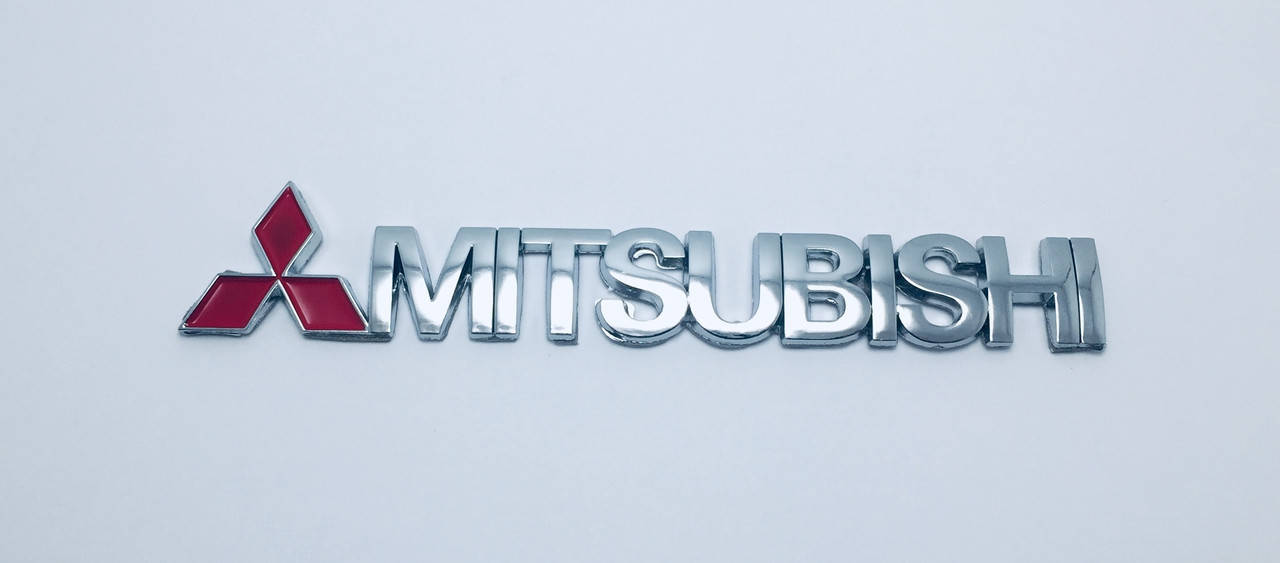 

Эмблема надпись багажника Mitsubishi