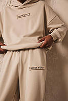 Чоловічі спортивні штани з нашитим надписом світлі на манжеті Salex
