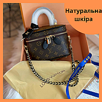 Женская сумка бочонок на цепочке Louis Vuitton из натуральной кожи