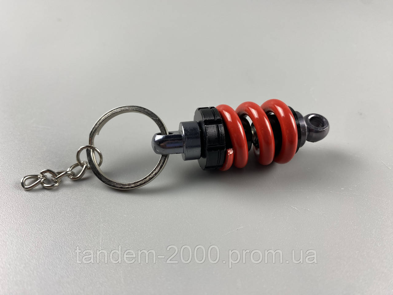 Брелок амортизатор хромований металевий, Авто брелок для автомобільних ключів чорно-червоний