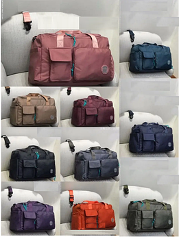 Сумка спортивна дорожня 49*29 см на блискавці з довгим ремінцем у різних кольорах Liza