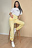 Джоггери жіночі жовтого кольору 162197P, фото 2
