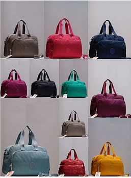 Сумка спортивна дорожня 41*26 см на блискавці з довгим ремінцем у різних кольорах Liza