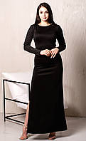 Жіноче довге обтягуюче вечірнє плаття в підлогу з розрізом і довгими рукавами. Трикотажне, однотонне. Чорне