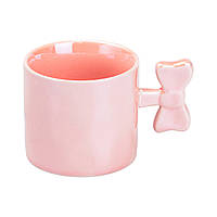 Чашка 350 (мл) с ручкой в виде бантика керамическая Ø 8.5 (см) розовая кружка