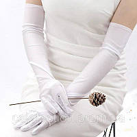Білі рукавички вище ліктя