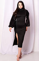 Елегантна сукня-гольф міді з рукавом реглан та розрізом, однотонна. Обтягуюча, трикотажна. Чорна