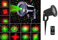 Уличный лазерный прожектор проектор Waterproof Lazer Звездное небо+фигуры с пультом (red + green) «Ф-С»