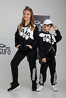 Штаны спортивные черно-белые с принтом для мальчика/девочки JO JO