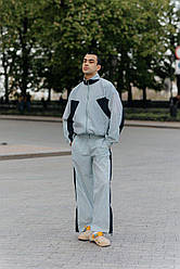 Спортивний чоловічий костюм-двійка з якісної тканини плащівка жатка чоловічий спортивний одяг на щодень