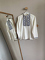 Дитяча вишиванка для хлопчика вишита темно синіми нитками