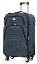 Тканинна середня валіза на чотирьох колесах 67L Gedox темно-синій