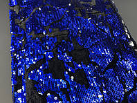 Тканина паєтка двостороння. Колір синьо-сріблястий на чорній оксамитовій основі.
