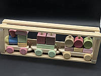 Дитяча дерев'яна іграшка "Потяг" різнобарвний (паровозик і два вагони) в пакованні