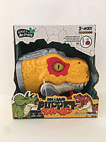 Іграшка динозавр інтерактивний жовтий на руку 12 см