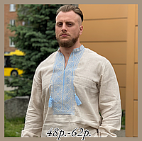 Мужская рубашка вышиванка из льна бежевого цвета с голубой вышивкой.