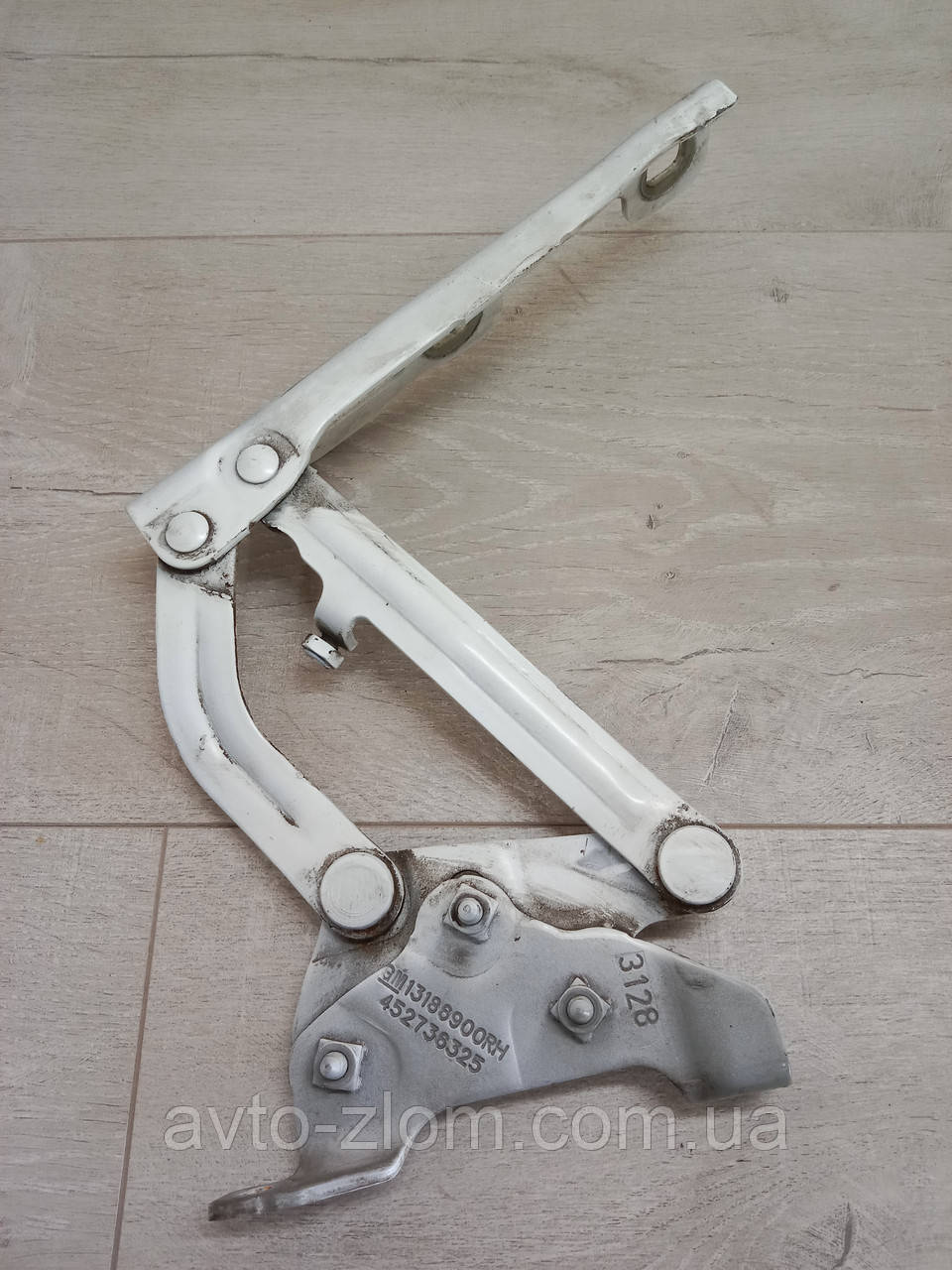 Петля капота Opel Corsa D. Опель Корса Д. Права. 13186900., фото 1