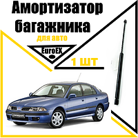 Амортизатор багажника газовый упор Mitsubishi Carisma 1995-> 520N/ 570MM (EuroEX)